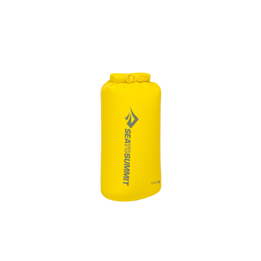 Yellow dry bag with Sea to Summit logo on a white background